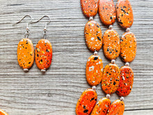 Load image into Gallery viewer, Paint splatter burnt orange Necklace, 3 Strand Statement Jewelry, orange Chunky bib bridesmaid everyday bubble jewelry earrings
