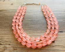 Load image into Gallery viewer, Peach Chunky Statement Necklace &amp; Stretch Bracelet set, Triple Strand Beaded Jewelry, light coral pink jewelry, bridesmaid jelly bean