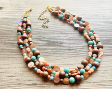 Load image into Gallery viewer, Chunky Coral Gold Brown Statement Necklace set jewelry, turquoise green peach bib necklace, geometric necklace triple strand peach