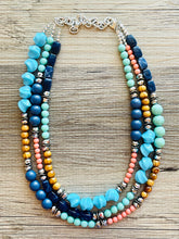 Load image into Gallery viewer, Tributaries Statement Necklace, chunky bib beaded jewelry, Summer blue coral green necklace, beaded glass jewelry wood chambray silver