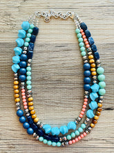 Load image into Gallery viewer, Tributaries Statement Necklace, chunky bib beaded jewelry, Summer blue coral green necklace, beaded glass jewelry wood chambray silver
