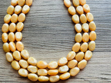 Load image into Gallery viewer, Fortune Favors the GOLD Statement 3 Strand statement necklace, pretty big beaded chunky jewelry, golden shiny metallic jewelry yellow