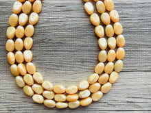Load image into Gallery viewer, Fortune Favors the GOLD Statement 3 Strand statement necklace, pretty big beaded chunky jewelry, golden shiny metallic jewelry yellow