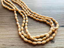 Load image into Gallery viewer, Birch Wood 3 Strand Beaded Necklace, vintage tan brown Jewelry Chunky statement necklace, big beaded necklace geometric boho