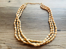 Load image into Gallery viewer, Birch Wood 3 Strand Beaded Necklace, vintage tan brown Jewelry Chunky statement necklace, big beaded necklace geometric boho