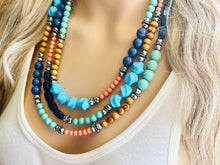 Load image into Gallery viewer, Tributaries Statement Necklace, chunky bib beaded jewelry, Summer blue coral green necklace, beaded glass jewelry wood chambray silver