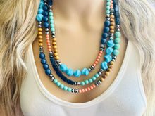 Load image into Gallery viewer, Tributaries Statement Necklace, chunky bib beaded jewelry, Summer blue coral green necklace, beaded glass jewelry wood chambray silver