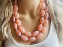 Load image into Gallery viewer, Peach Chunky Statement jewelry set, Big bib beaded jewelry, Double Strand Statement Necklace earrings, peach bridesmaid wedding coral