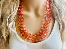 Load image into Gallery viewer, Translucent Coral 3 strand statement Necklace, Peach Beaded Necklace, summer silver jewelry, bubble bib neutral layer coral pink