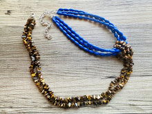 Load image into Gallery viewer, Royal Blue &amp; Tiger Eye Chip Necklace, tube beaded chunky statement necklace, blue necklace, avant garde necklace, geometric jewelry brown