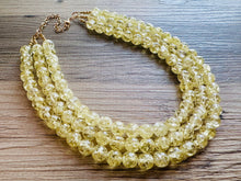 Load image into Gallery viewer, Speckled Pale Yellow Statement jewelry set, Chunky Beaded Necklace, yellow Jewelry, bright colorful Necklace yellow beaded earrings gold