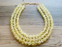 Load image into Gallery viewer, Speckled Pale Yellow Statement jewelry set, Chunky Beaded Necklace, yellow Jewelry, bright colorful Necklace yellow beaded earrings gold