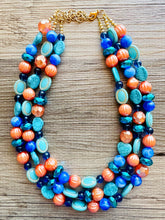 Load image into Gallery viewer, Fairy Dust Statement Necklace, multi Strand Beaded Jewelry, Blue Orange jewelry, gold and blue necklace, turquoise coral aqua big beaded