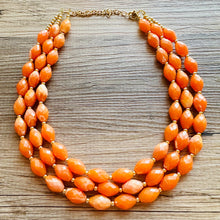 Load image into Gallery viewer, Clementine Statement Necklace, chunky bib beaded jewelry, Summer orange necklace, beaded acrylic jewelry orange 3 strand geometric