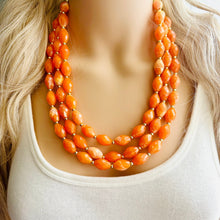 Load image into Gallery viewer, Clementine Statement Necklace, chunky bib beaded jewelry, Summer orange necklace, beaded acrylic jewelry orange 3 strand geometric