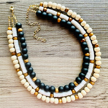 Load image into Gallery viewer, Wood chunky statement necklace, bib beaded jewelry 3 strand neutral necklace, wood multi strand wood, cream champagne Traveler Collection