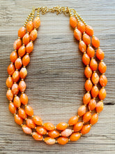 Load image into Gallery viewer, Clementine Statement Necklace, chunky bib beaded jewelry, Summer orange necklace, beaded acrylic jewelry orange 3 strand geometric