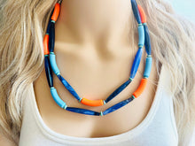 Load image into Gallery viewer, Orange &amp; Blue Color Block Chunky Statement Necklace, Big beaded jewelry, 2 Strand Statement Necklace, Bib dark blue orange beaded