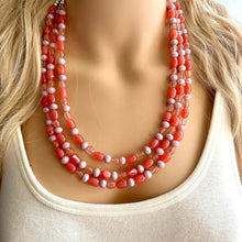 Load image into Gallery viewer, Chunky Multi Strand Grapefruit Statement Necklace, pink coral orange beaded jewelry, jelly necklace, coral jewelry, blush pink dress dressy