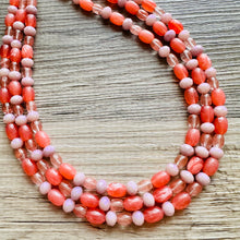 Load image into Gallery viewer, Chunky Multi Strand Grapefruit Statement Necklace, pink coral orange beaded jewelry, jelly necklace, coral jewelry, blush pink dress dressy