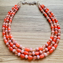 Load image into Gallery viewer, Chunky Multi Strand Grapefruit Statement Necklace, pink coral orange beaded jewelry, jelly necklace, coral jewelry, blush pink dress dressy