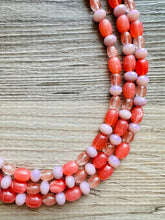 Load image into Gallery viewer, Chunky Multi Strand Grapefruit Statement Necklace, pink coral orange beaded jewelry, jelly necklace, coral jewelry, blush pink dress dressy