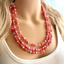 Load image into Gallery viewer, Chunky Multi Strand Grapefruit Statement Necklace, pink coral orange beaded jewelry, jelly necklace, coral jewelry, blush pink dress dressy