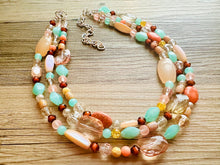 Load image into Gallery viewer, Peach Mint Coral Chunky Statement Necklace, Triple Strand Beaded Jewelry, green peach coral jewelry, bridsmaid wedding, bib beaded jewelry