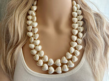 Load image into Gallery viewer, Paper Mache Heart Statement Necklace, Chunky double Strand Jewelry, Valentines Day jewelry, chunky cream bib beaded colorful off white gold