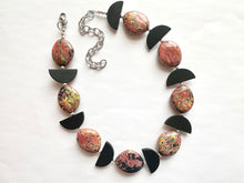 Load image into Gallery viewer, Swirl Coral &amp; Black Chunky Statement Necklace, Pink and black beaded jewelry, single Strand Bib Necklace, Beaded necklace, wood necklace