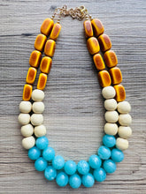 Load image into Gallery viewer, Shore to Sea Chunky Statement Necklace, double strand necklace, blue cream brown necklace, aqua blue wedding bridesmaid bib resin jewelry